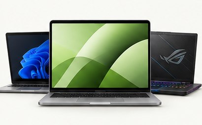 Three open laptops displayed together, including a gaming laptop