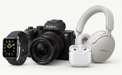 Smartwatch, camera, wireless earbuds and headphones displayed together